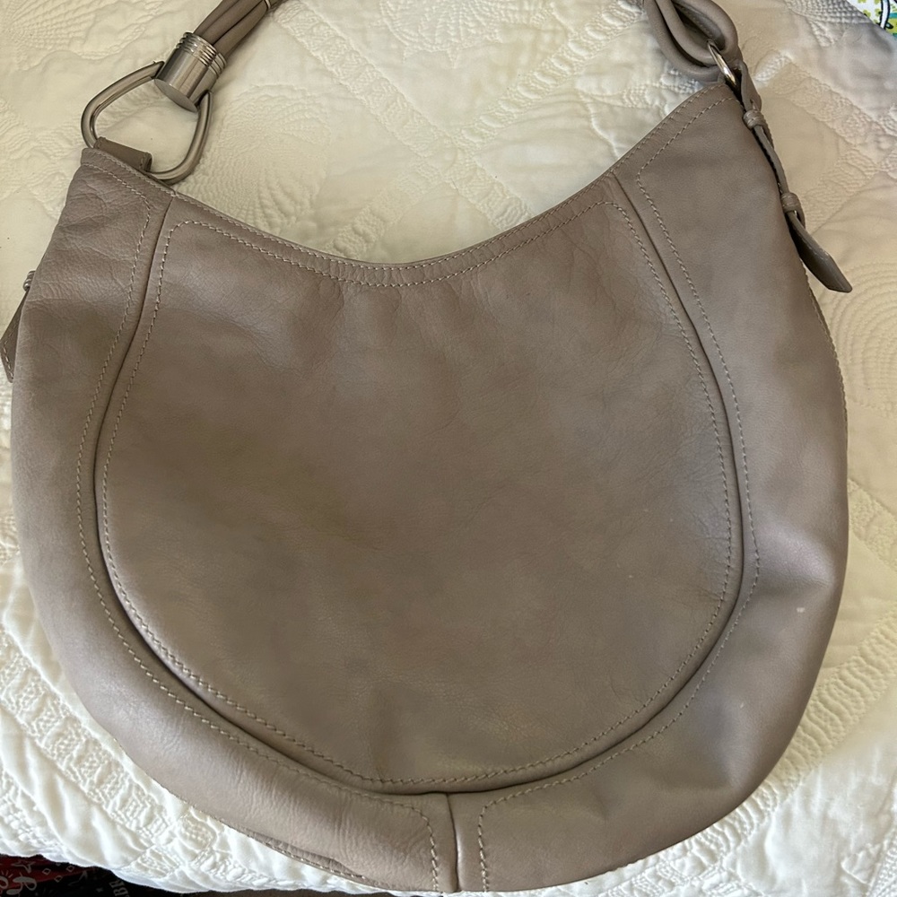 Taupe colored handbag. Measurements in the pictures.